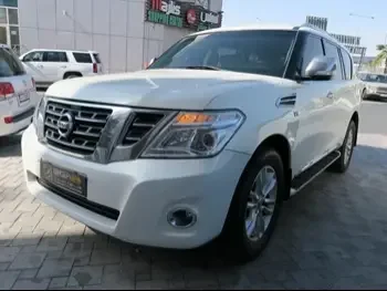 Nissan  Patrol  Platinum  2012  Automatic  446,000 Km  8 Cylinder  Four Wheel Drive (4WD)  SUV  White