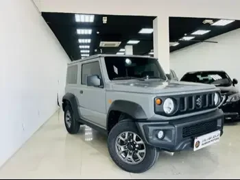 Suzuki  Jimny  2021  Automatic  28,000 Km  4 Cylinder  Four Wheel Drive (4WD)  SUV  Gray  With Warranty