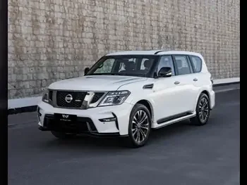 Nissan  Patrol  SE  2012  Automatic  185,000 Km  8 Cylinder  Four Wheel Drive (4WD)  SUV  White