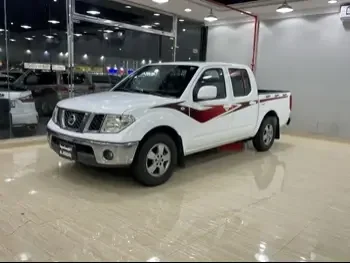 Nissan  Navara  2012  Automatic  303,000 Km  4 Cylinder  Rear Wheel Drive (RWD)  Pick Up  White