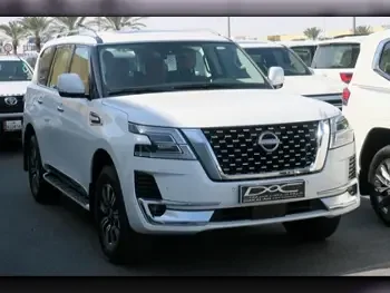 Nissan  Patrol  Titanium  2023  Automatic  27,000 Km  6 Cylinder  Four Wheel Drive (4WD)  SUV  White  With Warranty