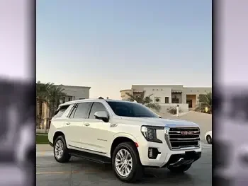 GMC  Yukon  SLT  2023  Automatic  16,000 Km  8 Cylinder  Four Wheel Drive (4WD)  SUV  White  With Warranty