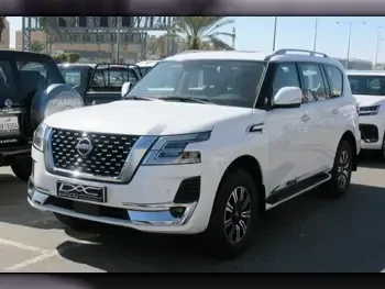 Nissan  Patrol  Titanium  2023  Automatic  27,000 Km  6 Cylinder  Four Wheel Drive (4WD)  SUV  White  With Warranty