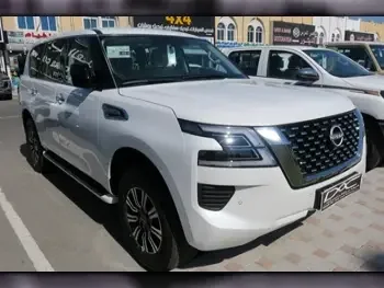 Nissan  Patrol  XE  2023  Automatic  0 Km  6 Cylinder  Four Wheel Drive (4WD)  SUV  White  With Warranty