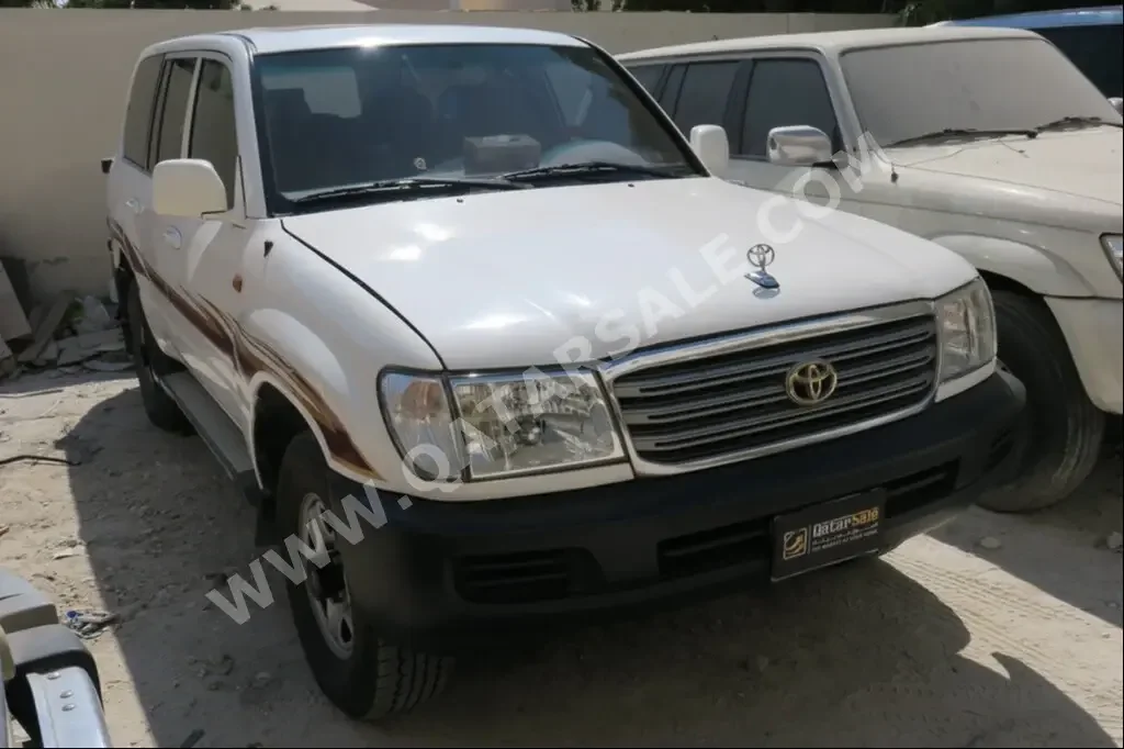 Toyota  Land Cruiser  GX  2005  Automatic  390,000 Km  6 Cylinder  Four Wheel Drive (4WD)  SUV  White