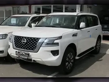 Nissan  Patrol  SE  2023  Automatic  0 Km  6 Cylinder  Four Wheel Drive (4WD)  SUV  White  With Warranty