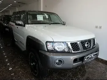 Nissan  Patrol  Super Safari  2022  Manual  0 Km  6 Cylinder  Four Wheel Drive (4WD)  SUV  White  With Warranty