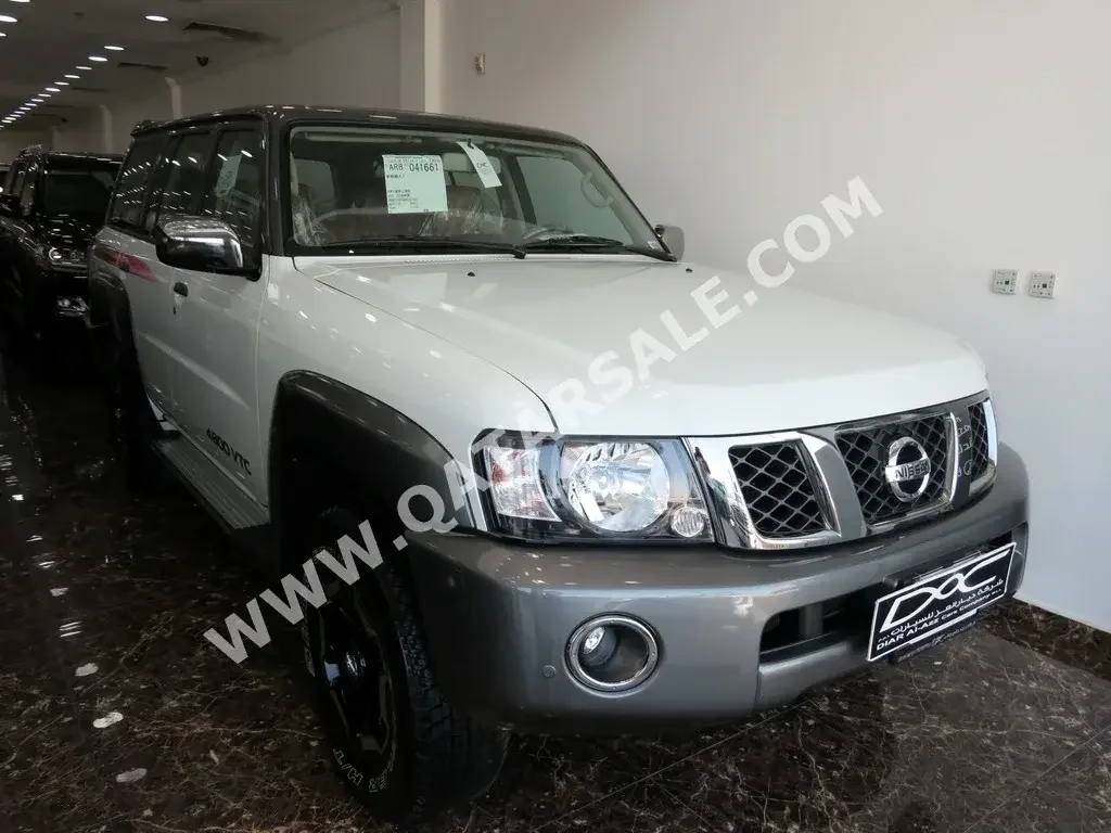 Nissan  Patrol  Super Safari  2022  Manual  0 Km  6 Cylinder  Four Wheel Drive (4WD)  SUV  White  With Warranty