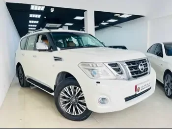 Nissan  Patrol  Platinum  2015  Automatic  195,000 Km  8 Cylinder  Four Wheel Drive (4WD)  SUV  White