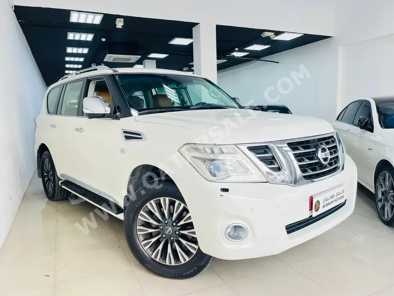 Nissan  Patrol  Platinum  2015  Automatic  195,000 Km  8 Cylinder  Four Wheel Drive (4WD)  SUV  White