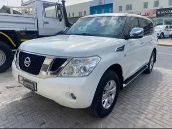 Nissan  Patrol  SE  2012  Automatic  157,000 Km  8 Cylinder  Four Wheel Drive (4WD)  SUV  White