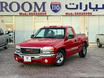 GMC  Sierra  SLE  2003  Automatic  100,000 Km  8 Cylinder  Rear Wheel Drive (RWD)  Pick Up  Red