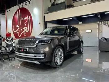  Land Rover  Range Rover  Vogue First Edition  2023  Automatic  9,000 Km  8 Cylinder  Four Wheel Drive (4WD)  SUV  Brown  With Warranty