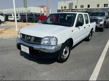 Nissan  Pickup  2015  Manual  285,000 Km  4 Cylinder  Rear Wheel Drive (RWD)  Pick Up  White