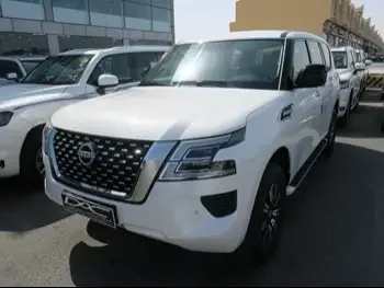 Nissan  Patrol  XE  2023  Automatic  0 Km  6 Cylinder  Four Wheel Drive (4WD)  SUV  White  With Warranty