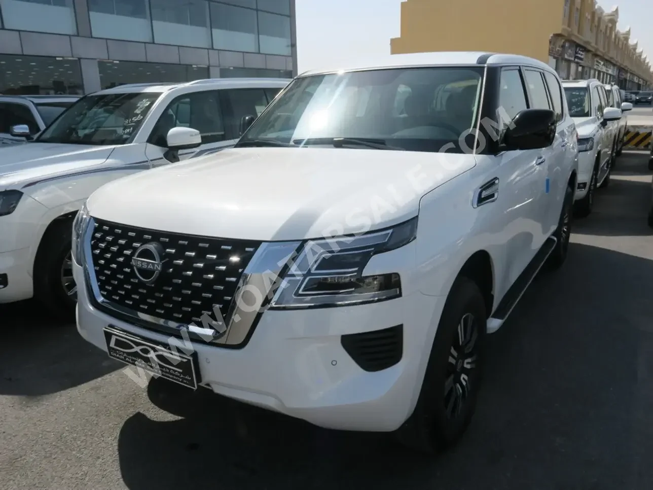 Nissan  Patrol  XE  2023  Automatic  0 Km  6 Cylinder  Four Wheel Drive (4WD)  SUV  White  With Warranty