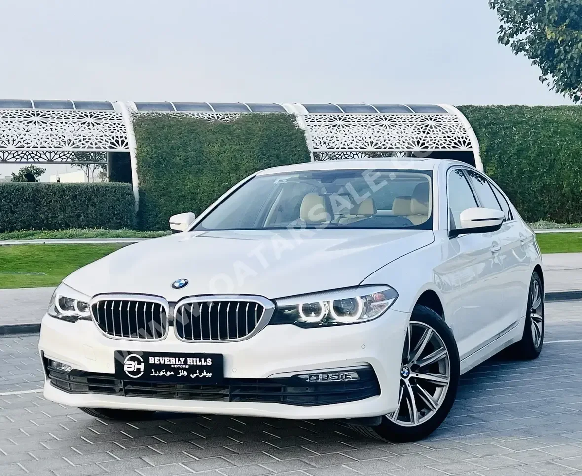 BMW  5-Series  520i  2018  Automatic  34,435 Km  4 Cylinder  Rear Wheel Drive (RWD)  Sedan  White