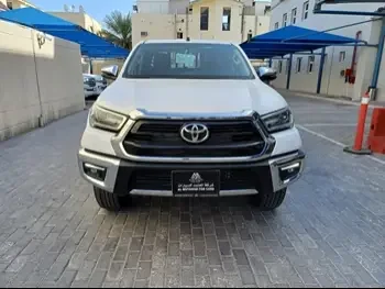 Toyota  Hilux  2024  Automatic  0 Km  4 Cylinder  Four Wheel Drive (4WD)  Pick Up  White  With Warranty