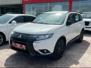 Mitsubishi  Outlander  2022  Automatic  23,000 Km  4 Cylinder  Four Wheel Drive (4WD)  SUV  White