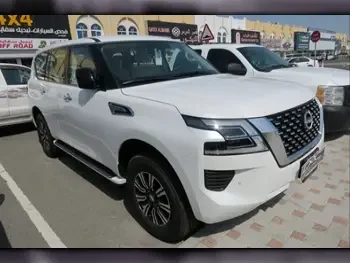 Nissan  Patrol  XE  2023  Automatic  0 Km  6 Cylinder  Four Wheel Drive (4WD)  SUV  White  With Warranty