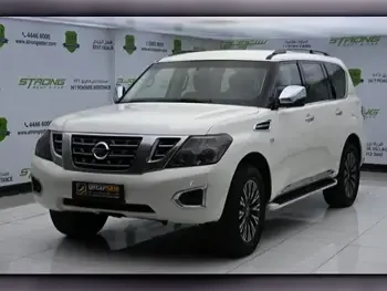 Nissan  Patrol  XE  2015  Automatic  194,000 Km  8 Cylinder  Four Wheel Drive (4WD)  SUV  White