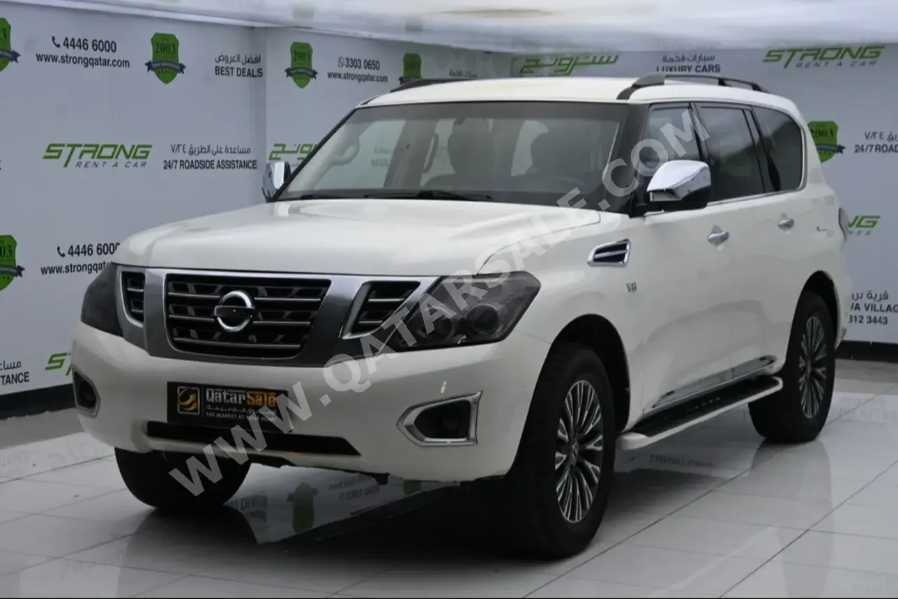 Nissan  Patrol  XE  2015  Automatic  194,000 Km  8 Cylinder  Four Wheel Drive (4WD)  SUV  White