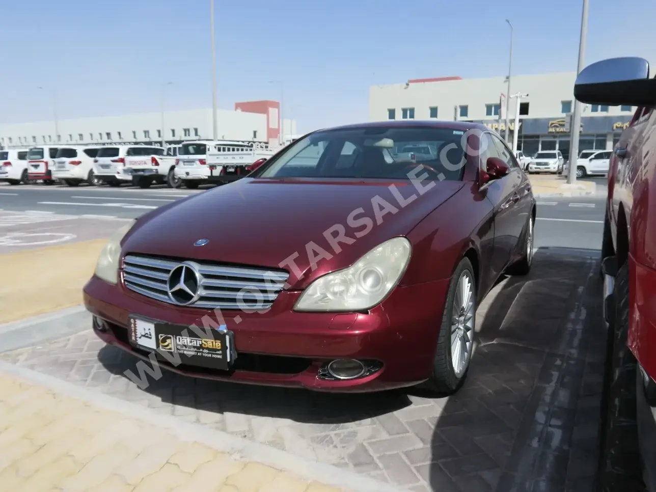 Mercedes-Benz  CLS  500  2005  Automatic  95,000 Km  8 Cylinder  Rear Wheel Drive (RWD)  Sedan  Red