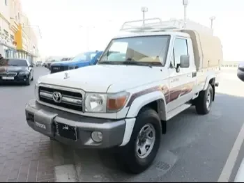 Toyota  Land Cruiser  LX  2009  Manual  100,000 Km  6 Cylinder  Four Wheel Drive (4WD)  Pick Up  White