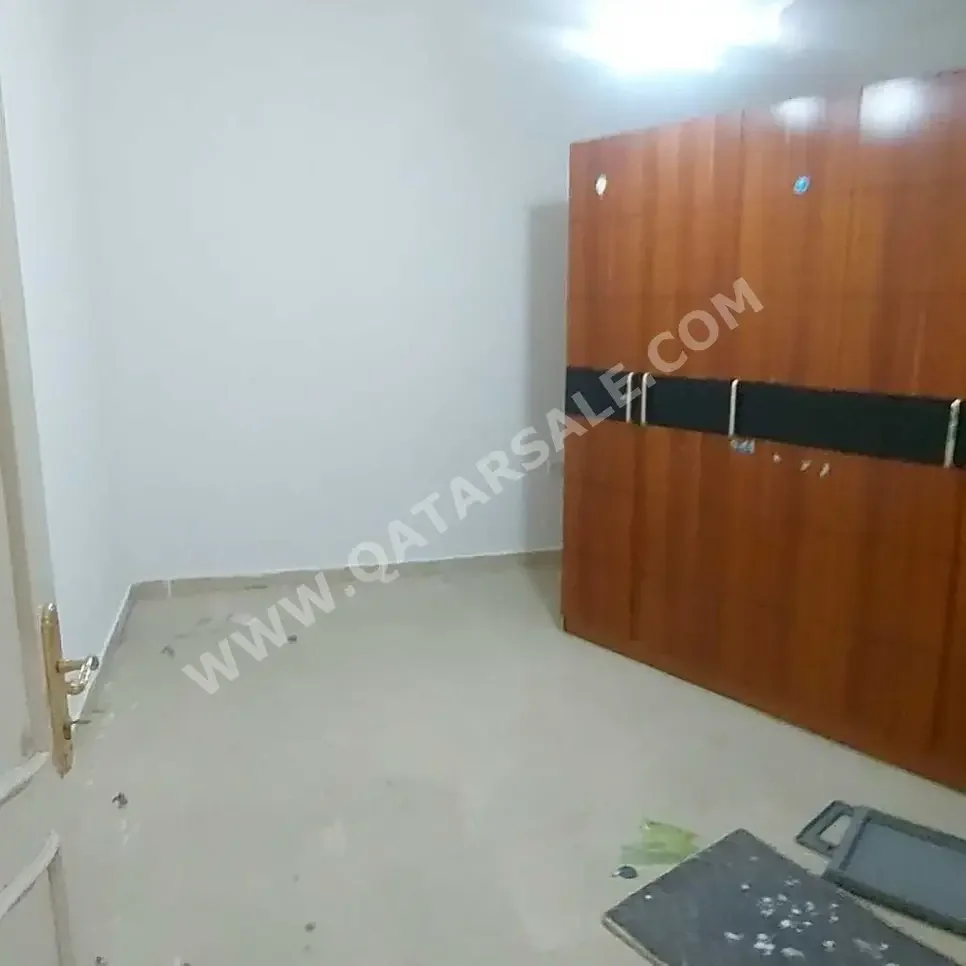 Farms & Resorts 2 Bedrooms  Apartment  For Rent  in Umm Salal -  Al Kharaitiyat  Not Furnished