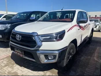 Toyota  Hilux  SR5  2021  Automatic  60,000 Km  4 Cylinder  Four Wheel Drive (4WD)  Pick Up  White