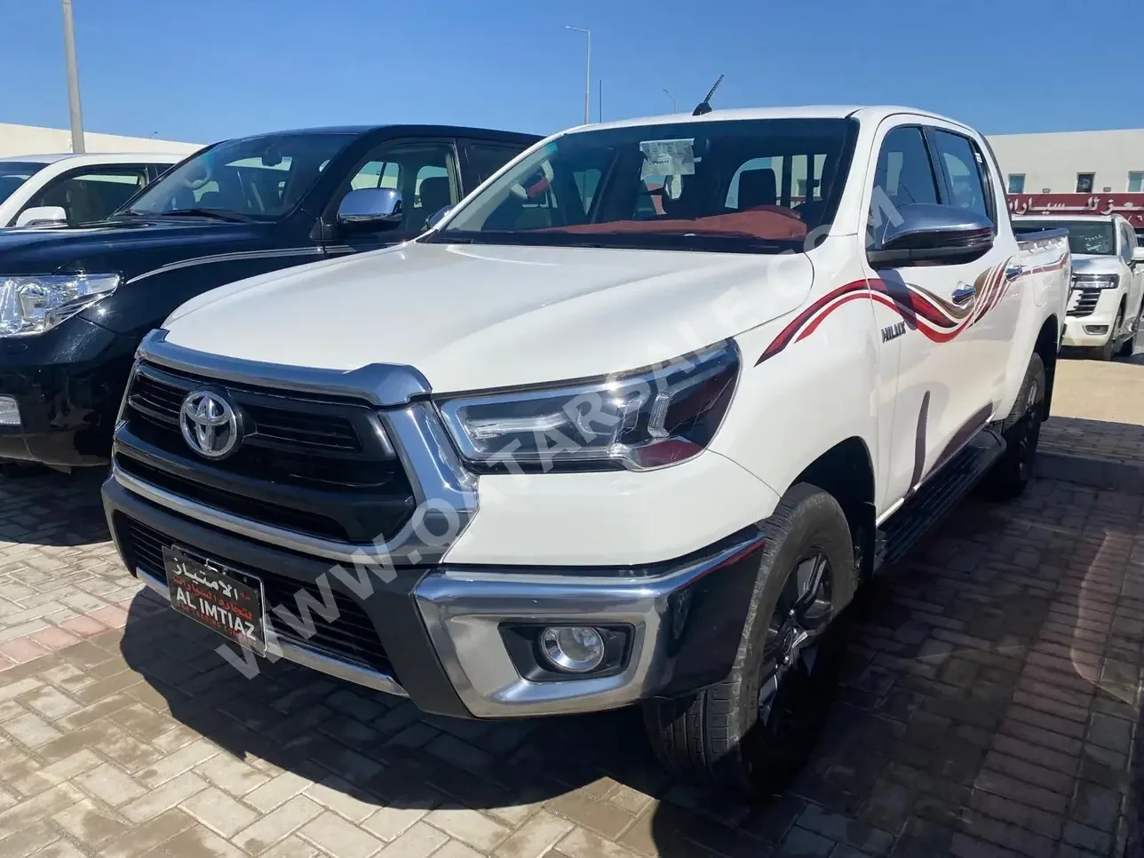 Toyota  Hilux  SR5  2021  Automatic  60,000 Km  4 Cylinder  Four Wheel Drive (4WD)  Pick Up  White