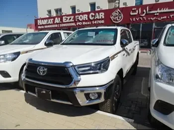 Toyota  Hilux  SR5  2024  Automatic  0 Km  4 Cylinder  Four Wheel Drive (4WD)  Pick Up  White  With Warranty