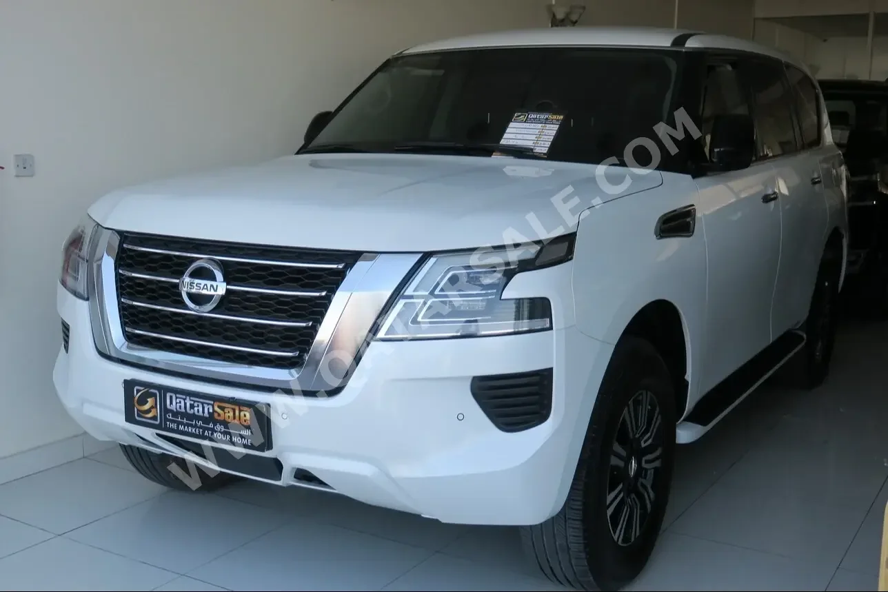 Nissan  Patrol  XE  2020  Automatic  75,000 Km  6 Cylinder  Four Wheel Drive (4WD)  SUV  White