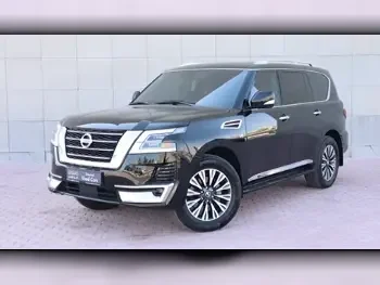 Nissan  Patrol  Titanium  2021  Automatic  64,000 Km  8 Cylinder  Four Wheel Drive (4WD)  SUV  Black