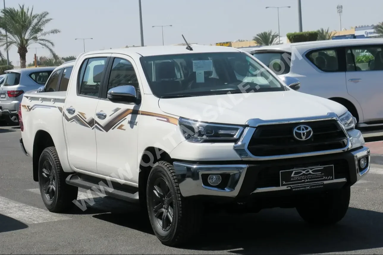 Toyota  Hilux  2024  Automatic  0 Km  4 Cylinder  Four Wheel Drive (4WD)  Pick Up  White  With Warranty