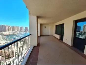 2 Bedrooms  Apartment  For Rent  Doha -  The Pearl  Semi Furnished