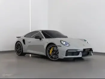  Porsche  911  Turbo S  2024  Automatic  5,300 Km  6 Cylinder  All Wheel Drive (AWD)  Coupe / Sport  Gray Nardo  With Warranty