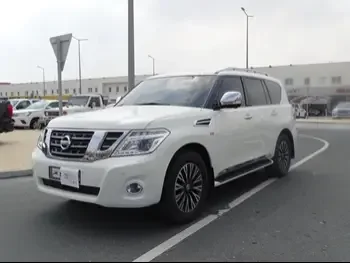 Nissan  Patrol  Platinum  2015  Automatic  80,000 Km  8 Cylinder  Four Wheel Drive (4WD)  SUV  White