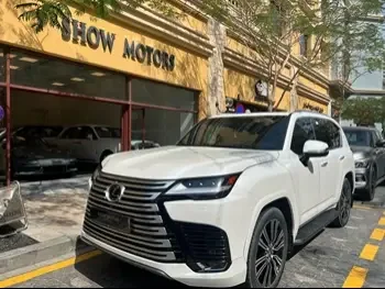 Lexus  LX  600 Luxury  2023  Automatic  49,000 Km  6 Cylinder  Four Wheel Drive (4WD)  SUV  White  With Warranty