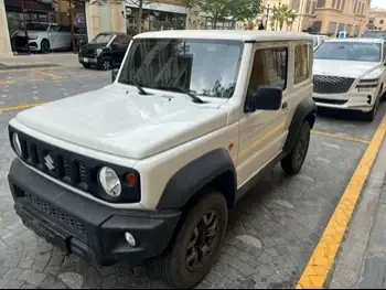 Suzuki  Jimny  2021  Automatic  1,700 Km  4 Cylinder  Four Wheel Drive (4WD)  SUV  White  With Warranty