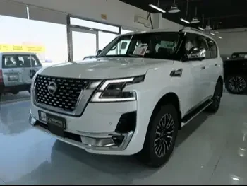 Nissan  Patrol  Platinum  2023  Automatic  0 Km  6 Cylinder  Four Wheel Drive (4WD)  SUV  White  With Warranty