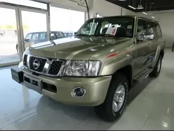 Nissan  Patrol  Safari  2023  Automatic  0 Km  6 Cylinder  Four Wheel Drive (4WD)  SUV  Gold  With Warranty