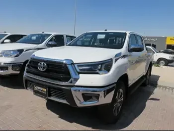 Toyota  Hilux  SR5  2024  Automatic  0 Km  4 Cylinder  Four Wheel Drive (4WD)  Pick Up  White  With Warranty