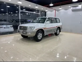 تويوتا  لاند كروزر  جي اكس ار  2004  عادي  310,000 كم  6 سلندر  دفع رباعي  اس يو في  أبيض