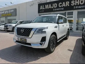 Nissan  Patrol  Platinum  2023  Automatic  0 Km  6 Cylinder  Four Wheel Drive (4WD)  SUV  White  With Warranty