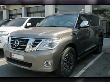 Nissan  Patrol  Platinum  2014  Automatic  210,000 Km  8 Cylinder  Four Wheel Drive (4WD)  SUV  Beige