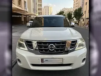 Nissan  Patrol  Platinum  2015  Automatic  160,000 Km  8 Cylinder  Four Wheel Drive (4WD)  SUV  White