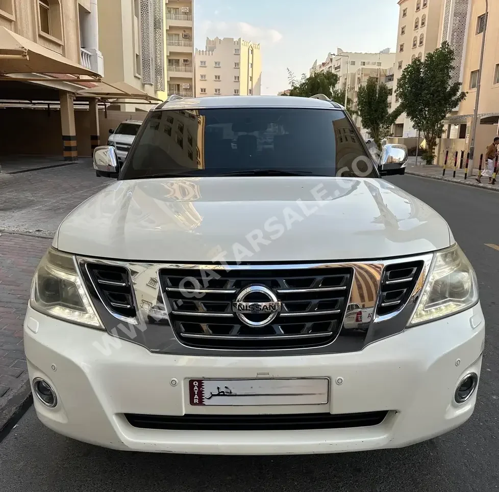 Nissan  Patrol  Platinum  2015  Automatic  160,000 Km  8 Cylinder  Four Wheel Drive (4WD)  SUV  White