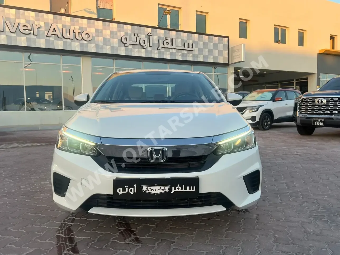 Honda  City  2021  Automatic  65,000 Km  4 Cylinder  Front Wheel Drive (FWD)  Sedan  White