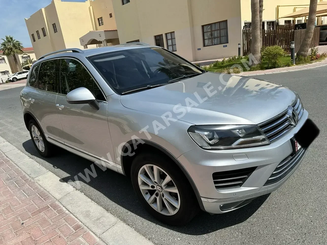 Volkswagen  Touareg  2016  Automatic  60,000 Km  6 Cylinder  Four Wheel Drive (4WD)  SUV  Silver